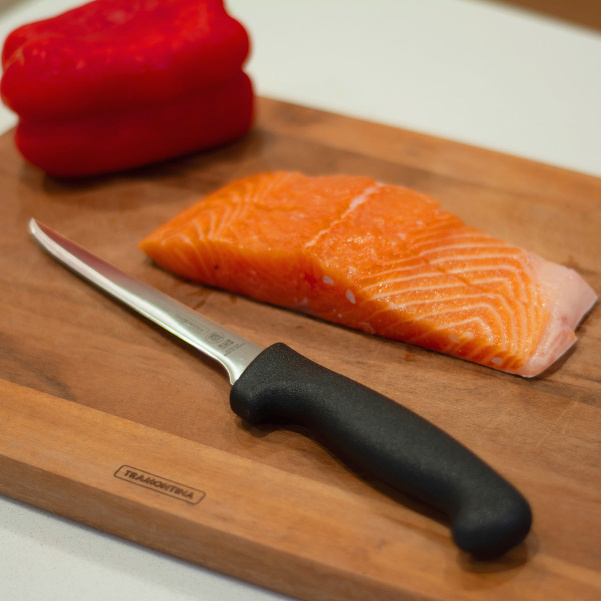 Tramontina Professional Master Black Handle Boning Knife Straight Narrow Flexible Lifestyle Tomkin Australia Hospitality Supplies