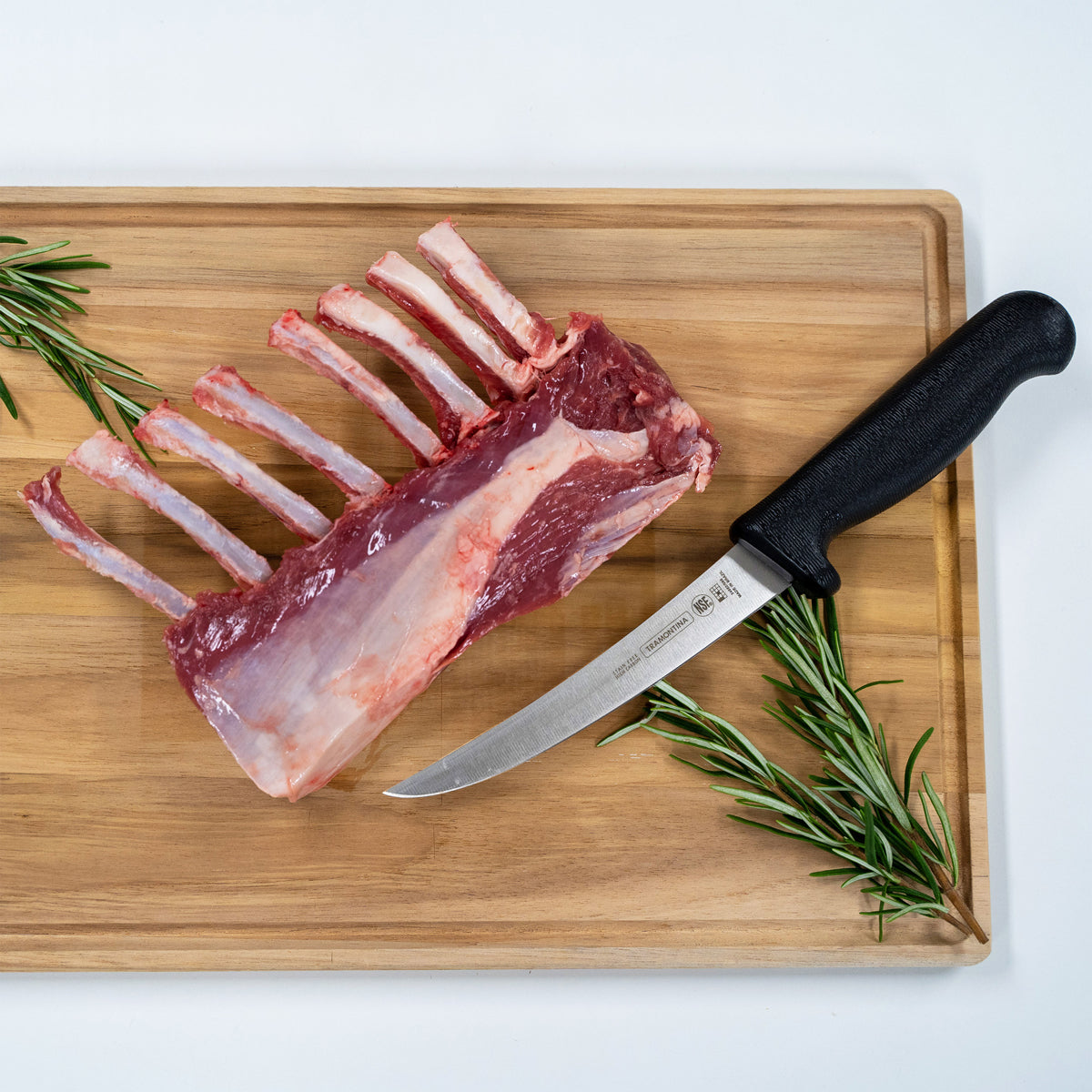 Tramontina Professional Black Handle Boning Knife Curved Stiff Lifestyle Tomkin Australia Hospitality Supplies