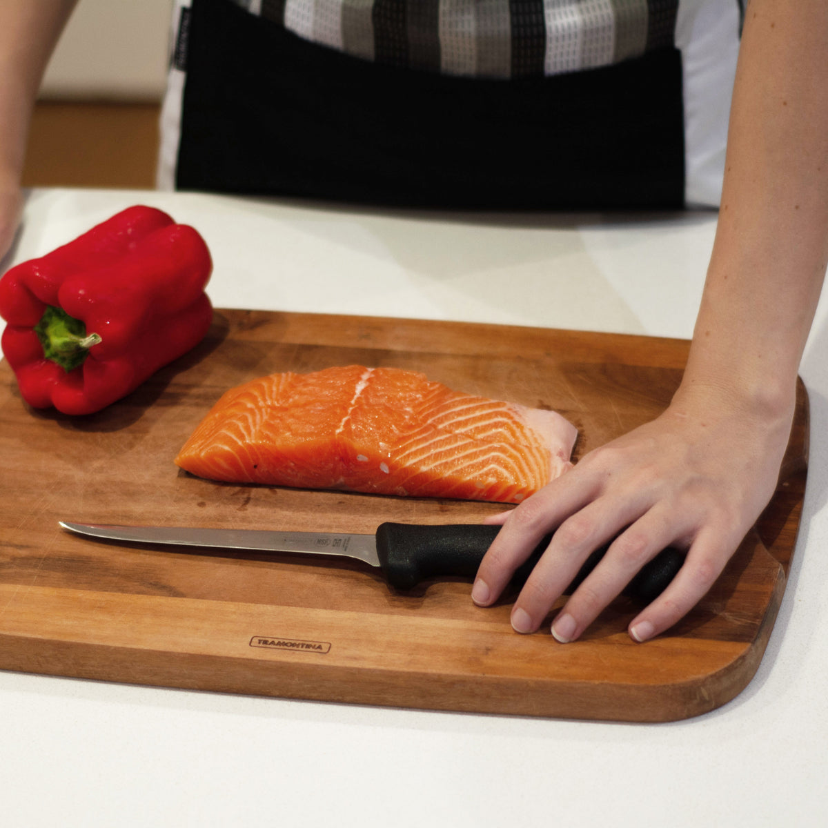 Tramontina Professional Master Black Boning Knife Straight with Narrow Flexi Blade Lifestyle Tomkin Australia Hospitality Supplies