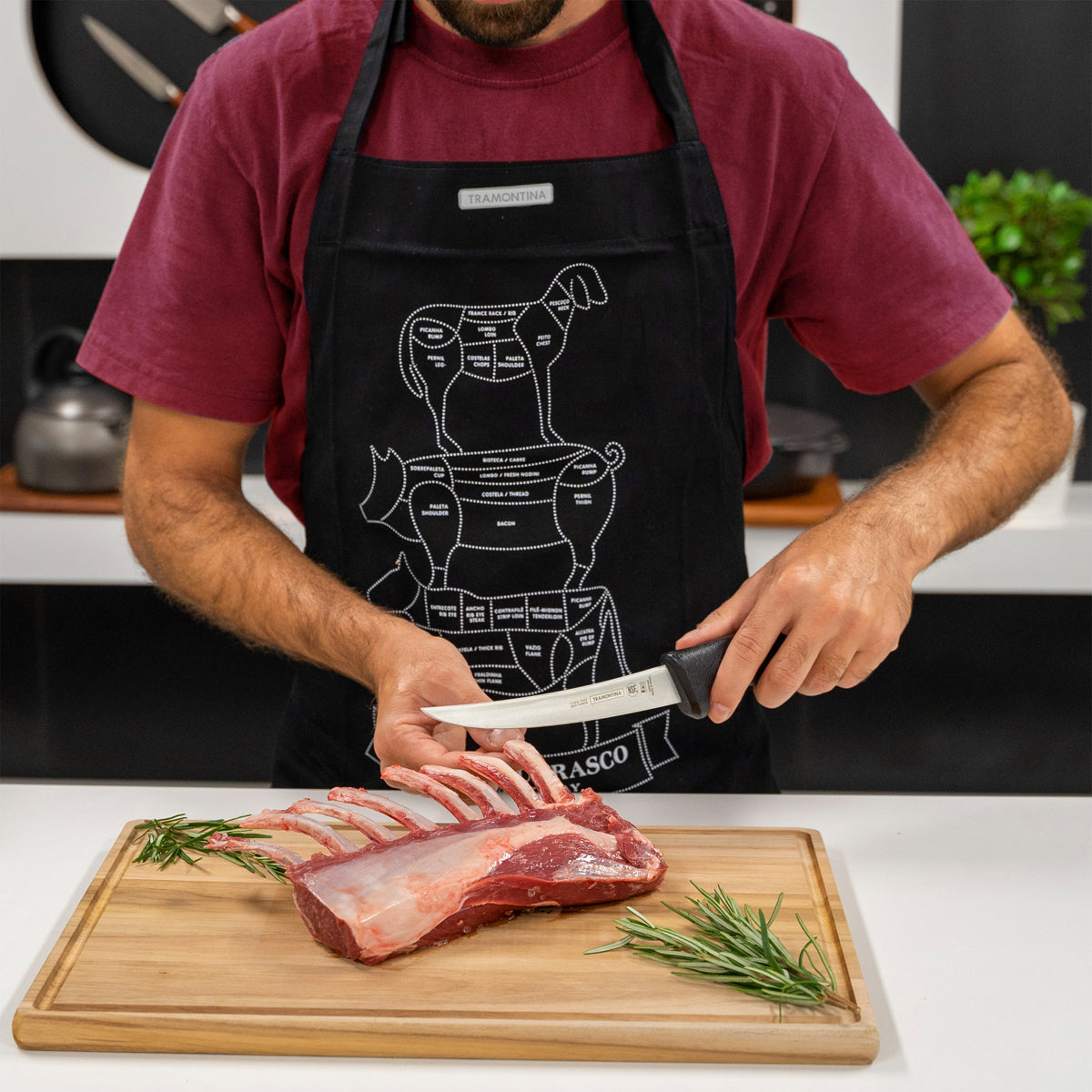 Tramontina Professional Black Handle Boning Knife Curved Stiff Lifestyle Tomkin Australia Hospitality Supplies