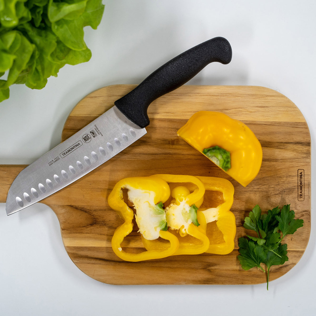 Tramontina Professional Master Black Handle Santoku Knife Fluted Lifestyle Tomkin Australia Hospitality Supplies