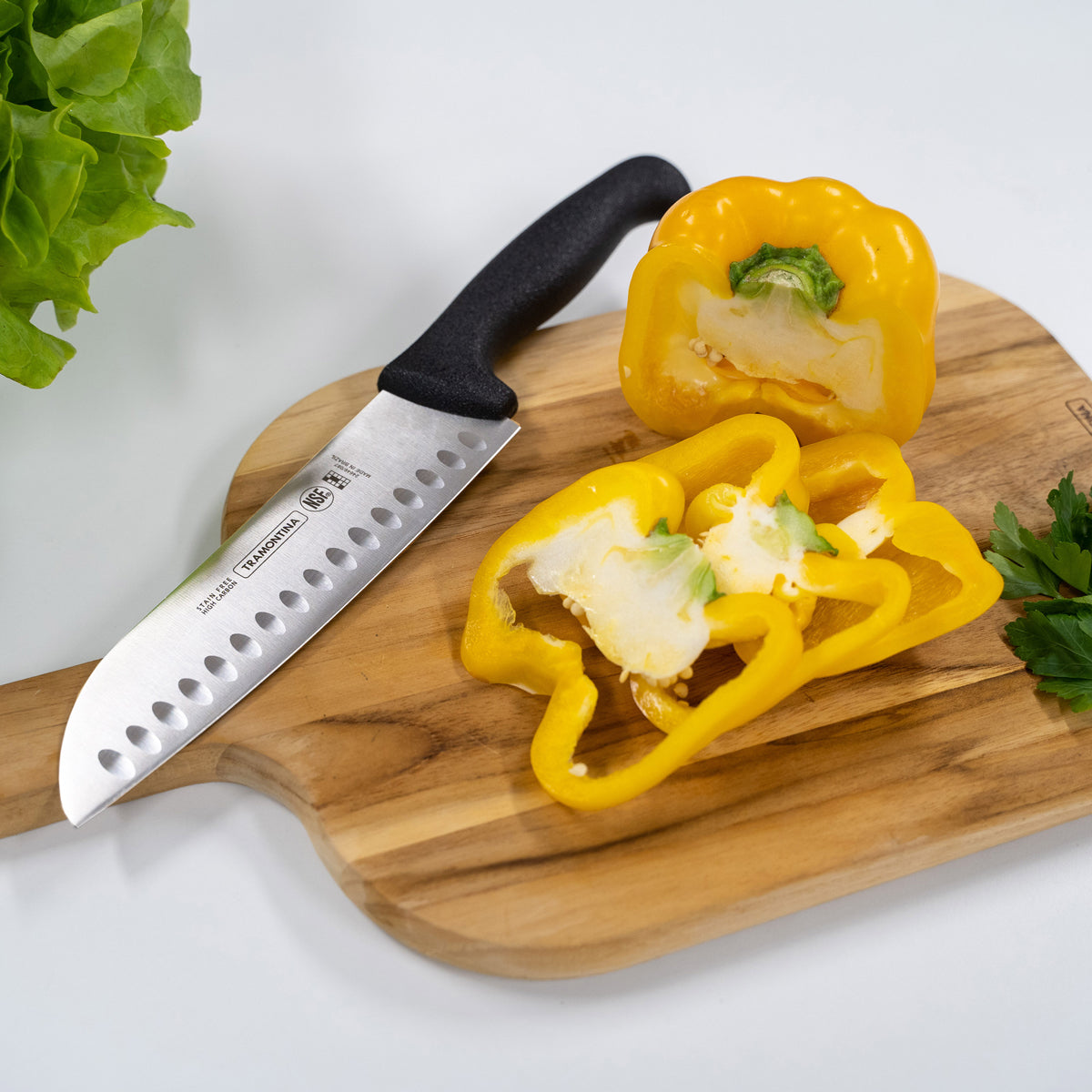 Tramontina Professional Master Black Handle Santoku Knife Fluted Lifestyle Tomkin Australia Hospitality Supplies