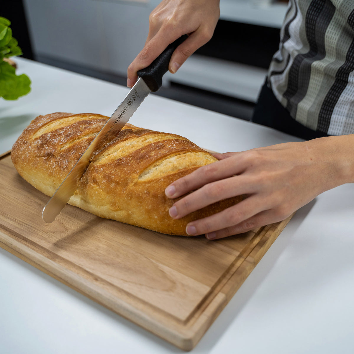 Tramontina Professional Master Black Handle Bread Knife Serrated Lifestyle Tomkin Australia Hospitality Supplies