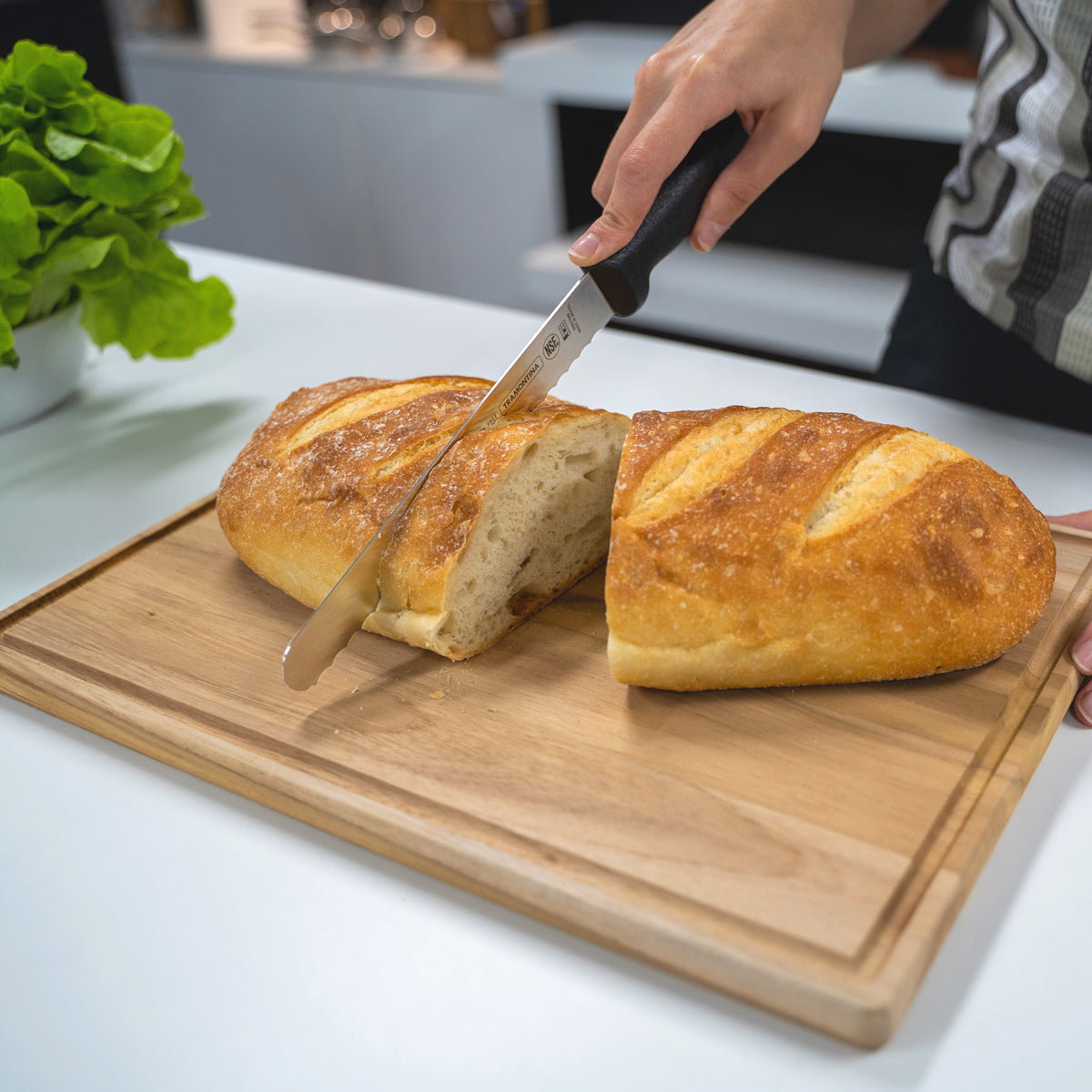 Tramontina Professional Master Black Handle Bread Knife Serrated Lifestyle Tomkin Australia Hospitality Supplies