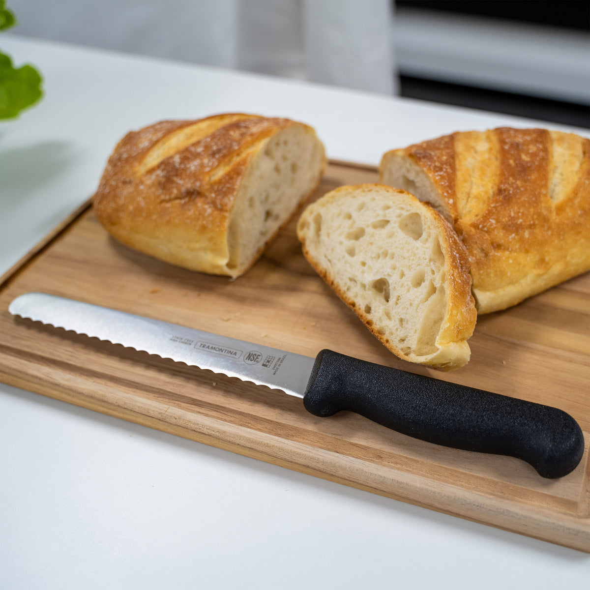 Tramontina Professional Master Black Handle Bread Knife Serrated Lifestyle Tomkin Australia Hospitality Supplies