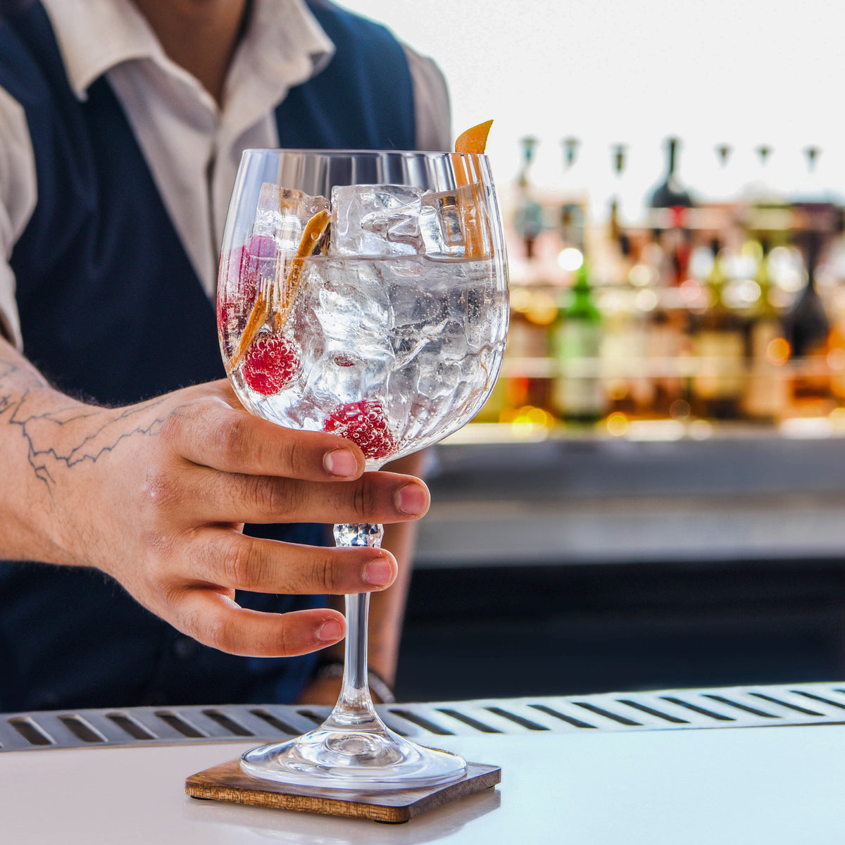 Zanzi Square Coaster Natural Acacia 4pc Set Lifestyle Tomkin Australia Hospitality Supplies